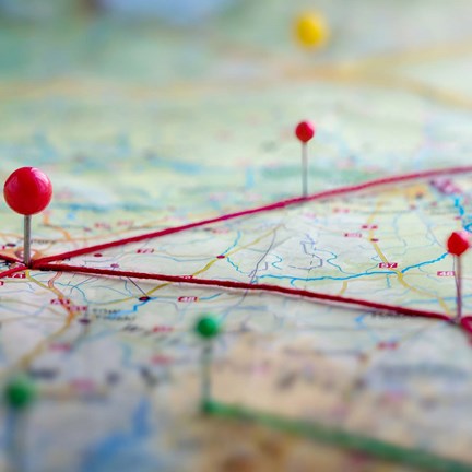 Location marking with a red pins on a map with routes.