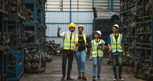 Engineering team together in old garage used auto part warehouse