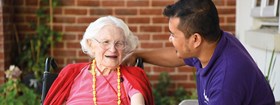 BenCare Image Of Carer and Resident Smiling Outside